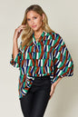 Double Take Full Size Geometric Notched Dolman Sleeve Top